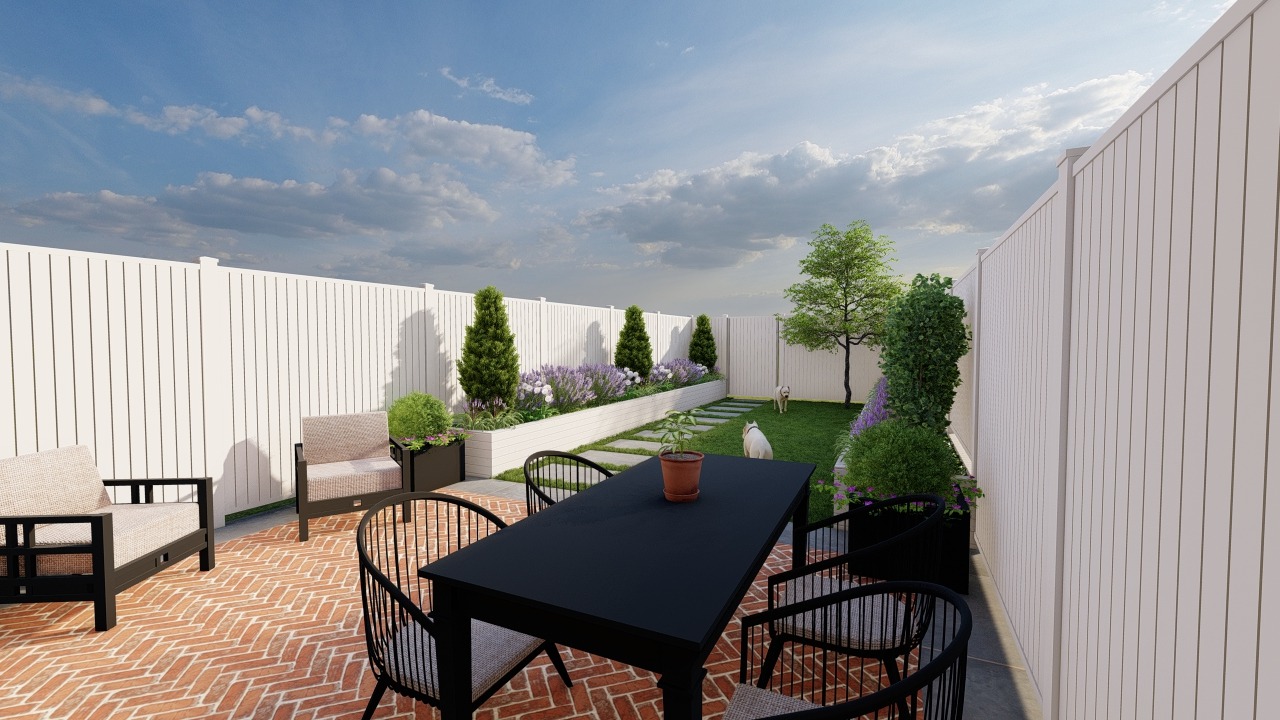 Cozy backyard patio with furniture and greenery.